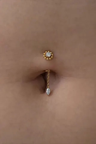 Fotografia real de un piercing realizado en Arkadia